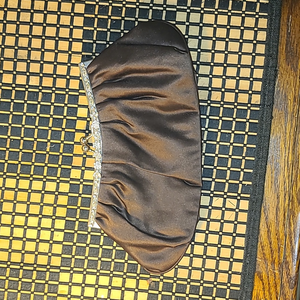 Brown silk clutch brand new fancy